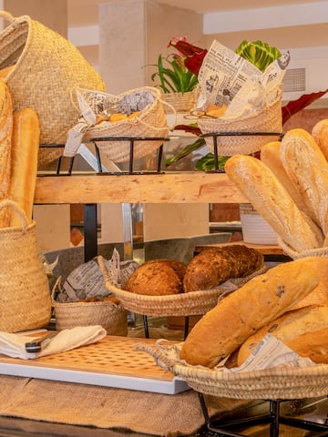 a display of bread and bread in baskets