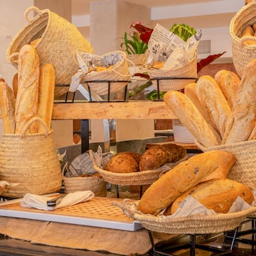 a display of bread and bread in baskets