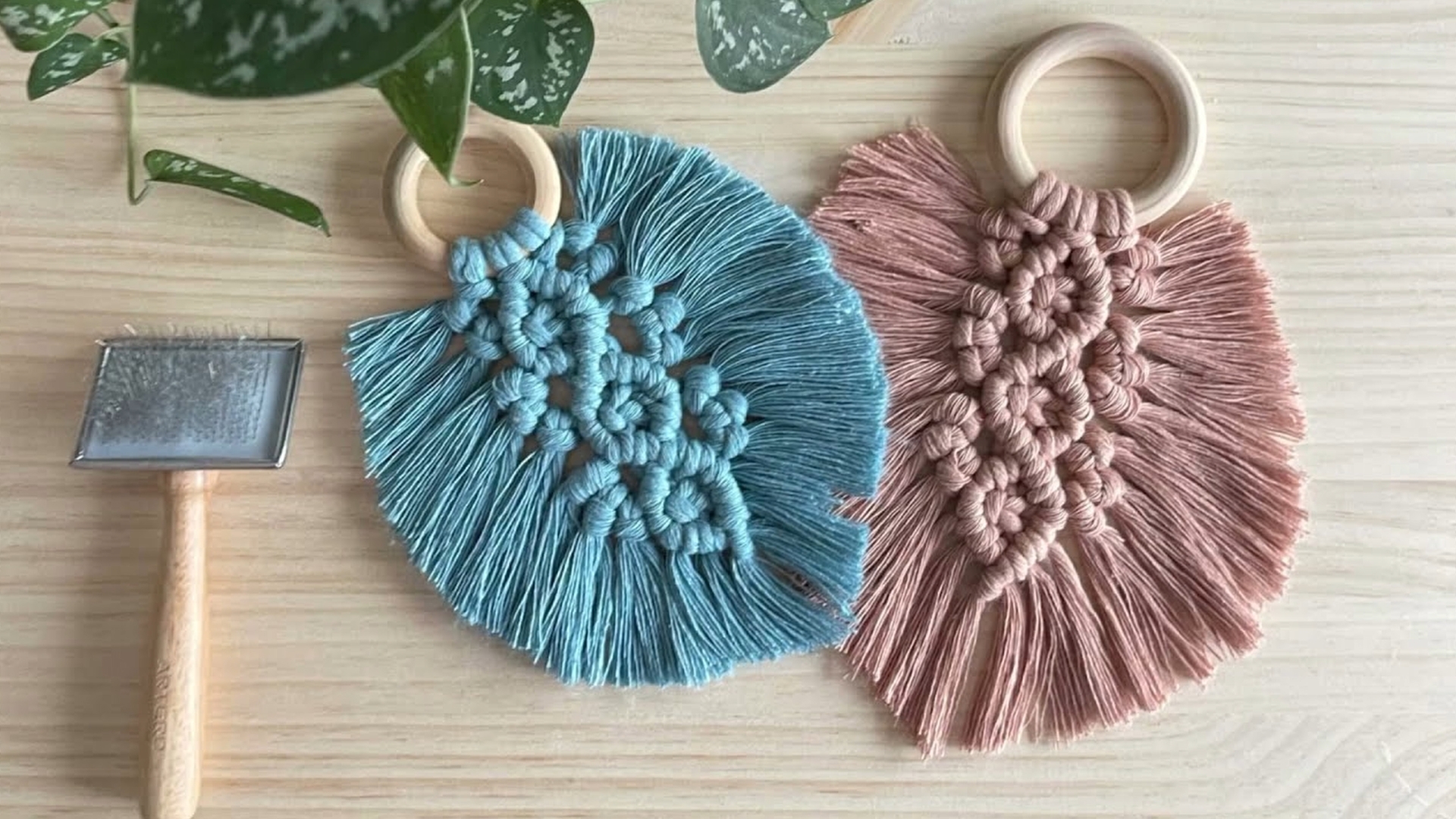 a pair of blue and pink macrame objects