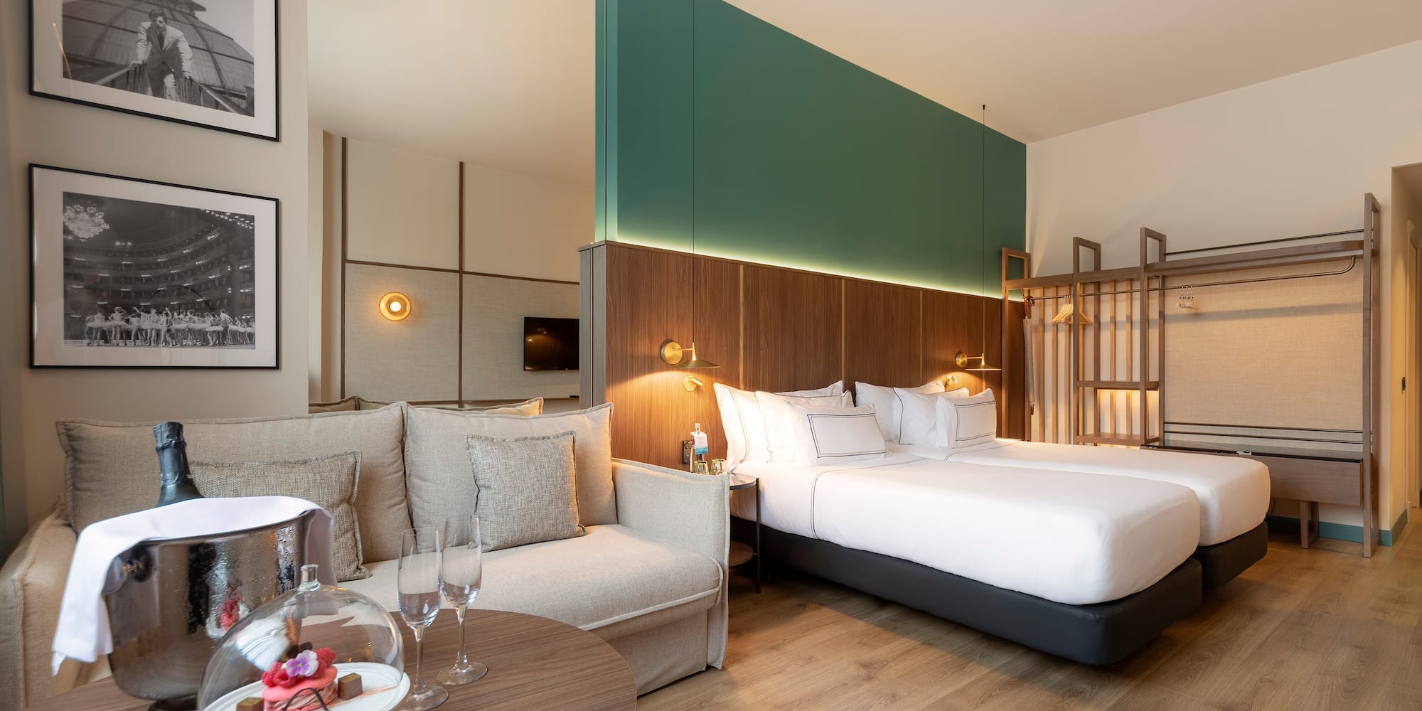 a room with a bed and couches