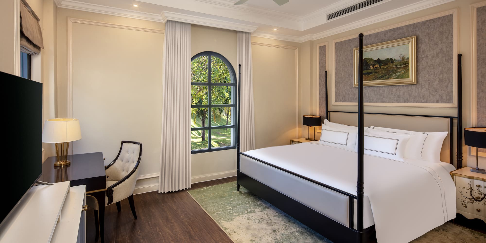 a room with a bed and a desk