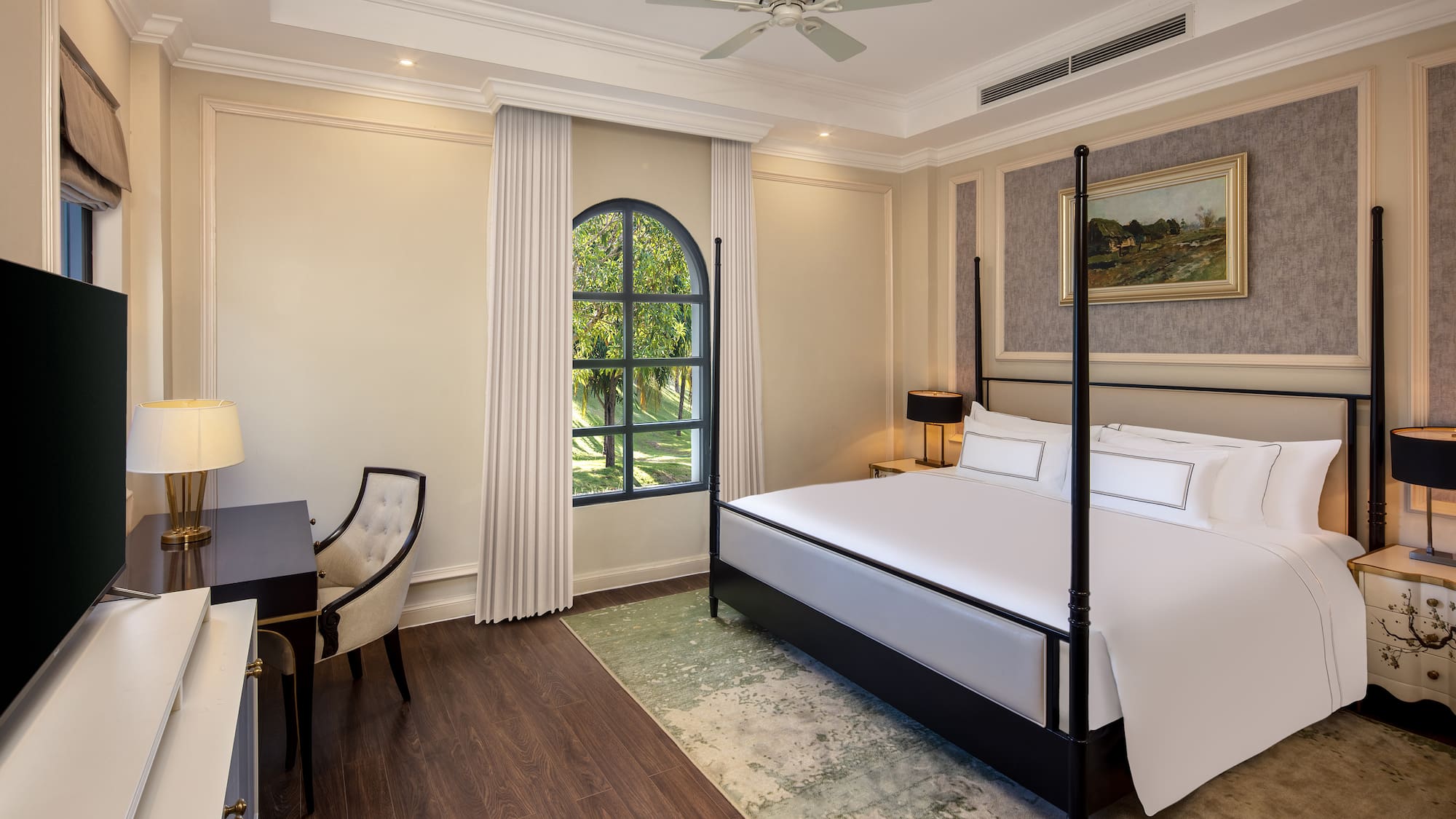 a room with a bed and a desk