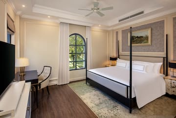 a room with a bed and a desk