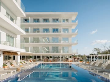 a pool in front of a building