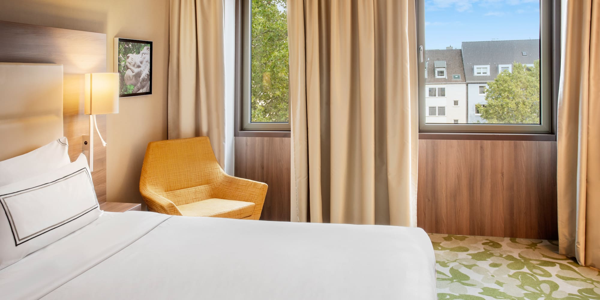 a room with a bed and a chair