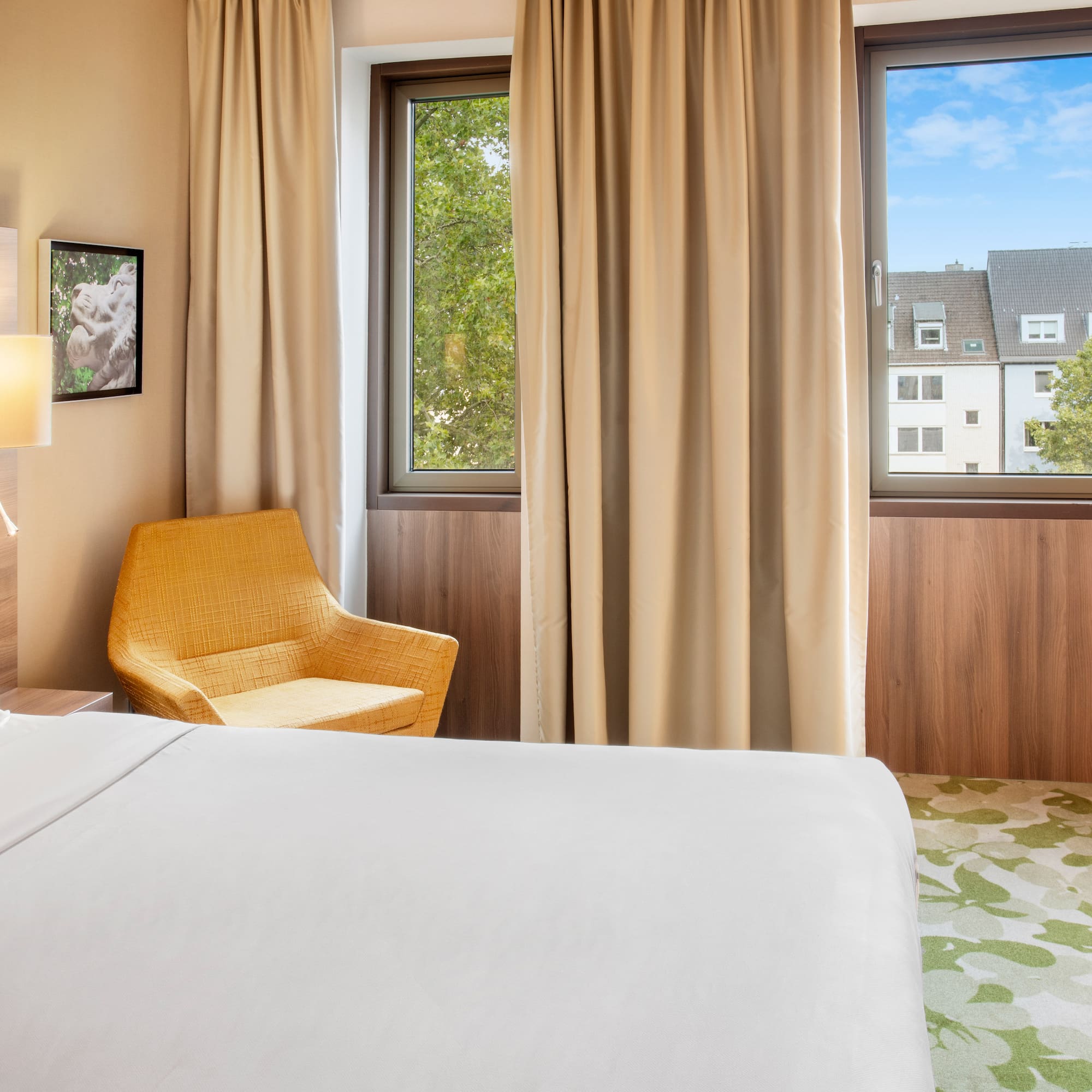 a room with a bed and a chair