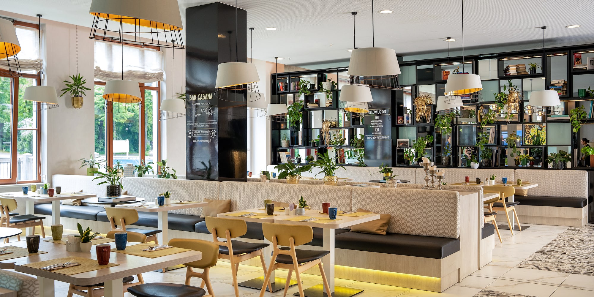 a restaurant with tables and chairs