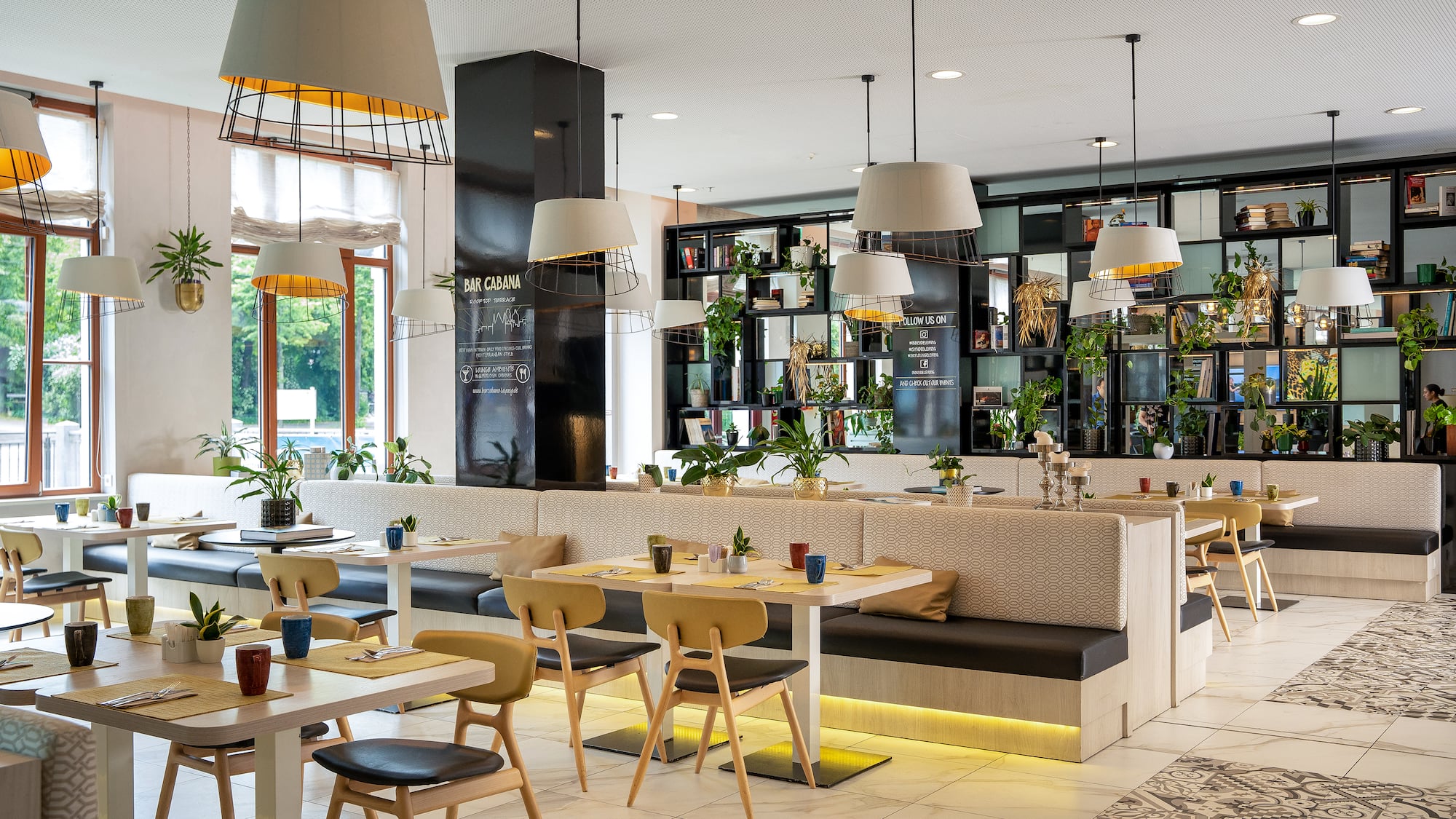 a restaurant with tables and chairs