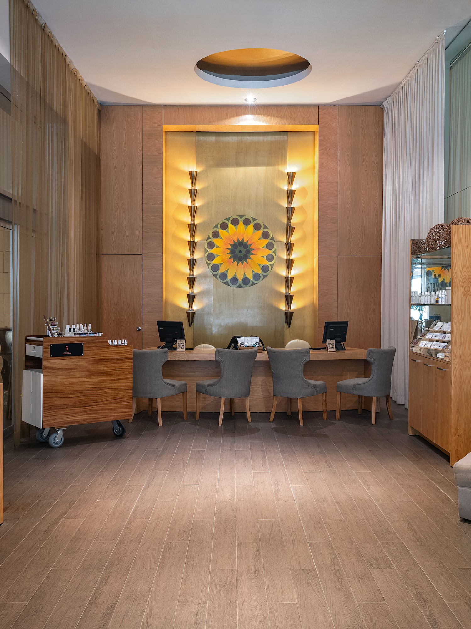 a room with a desk and chairs