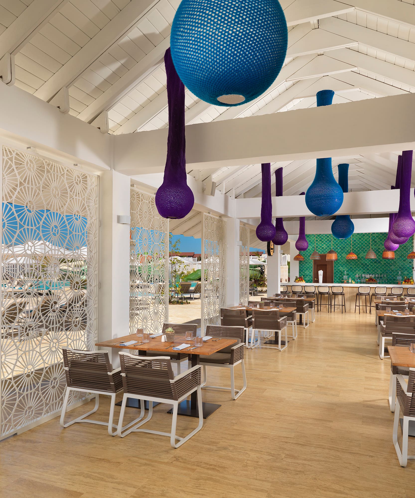 a restaurant with tables and chairs