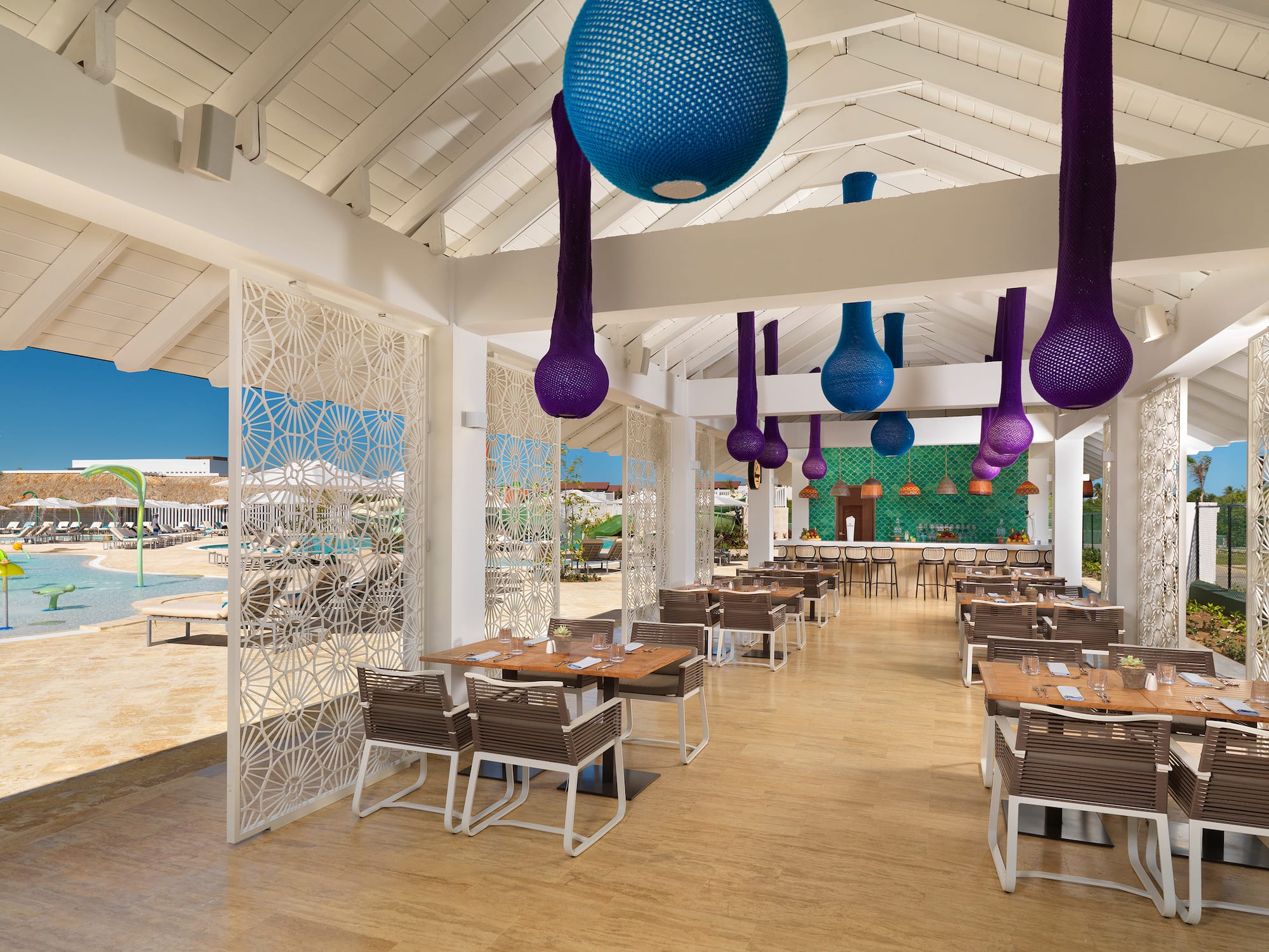 a restaurant with tables and chairs