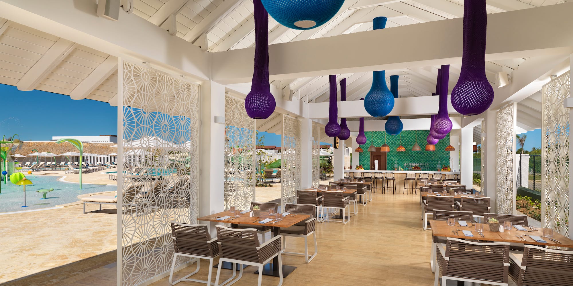 a restaurant with tables and chairs