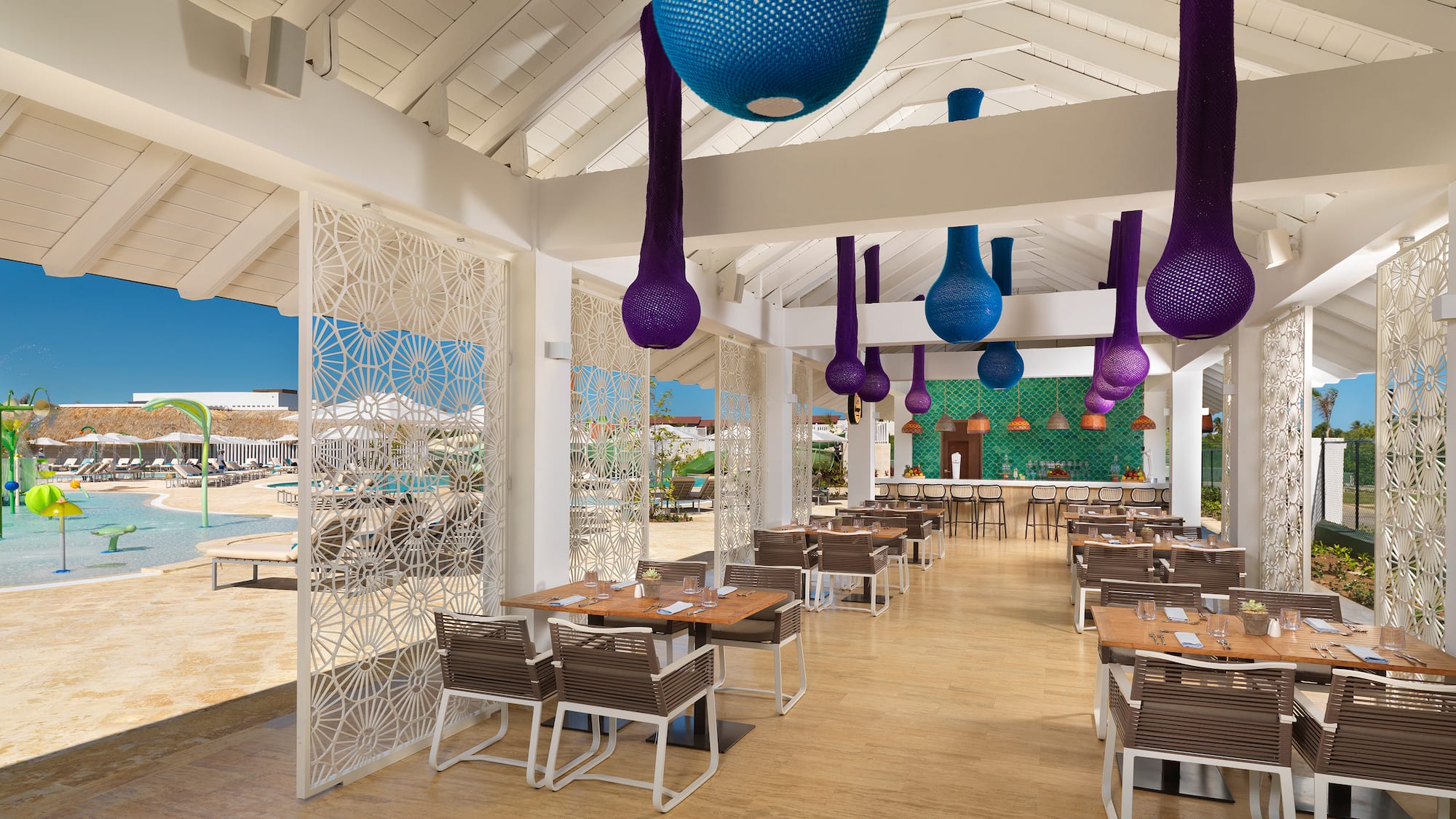 a restaurant with tables and chairs