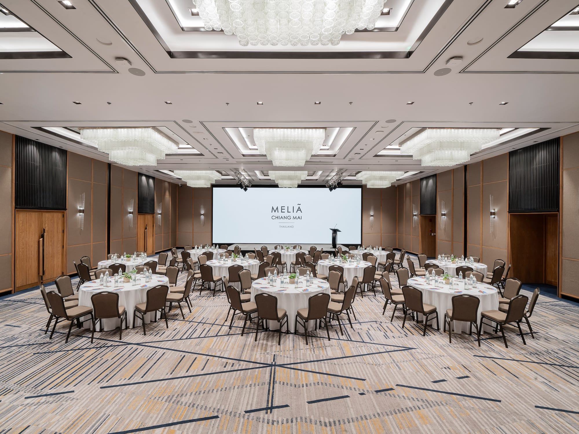 a room with tables and chairs