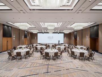 a room with tables and chairs