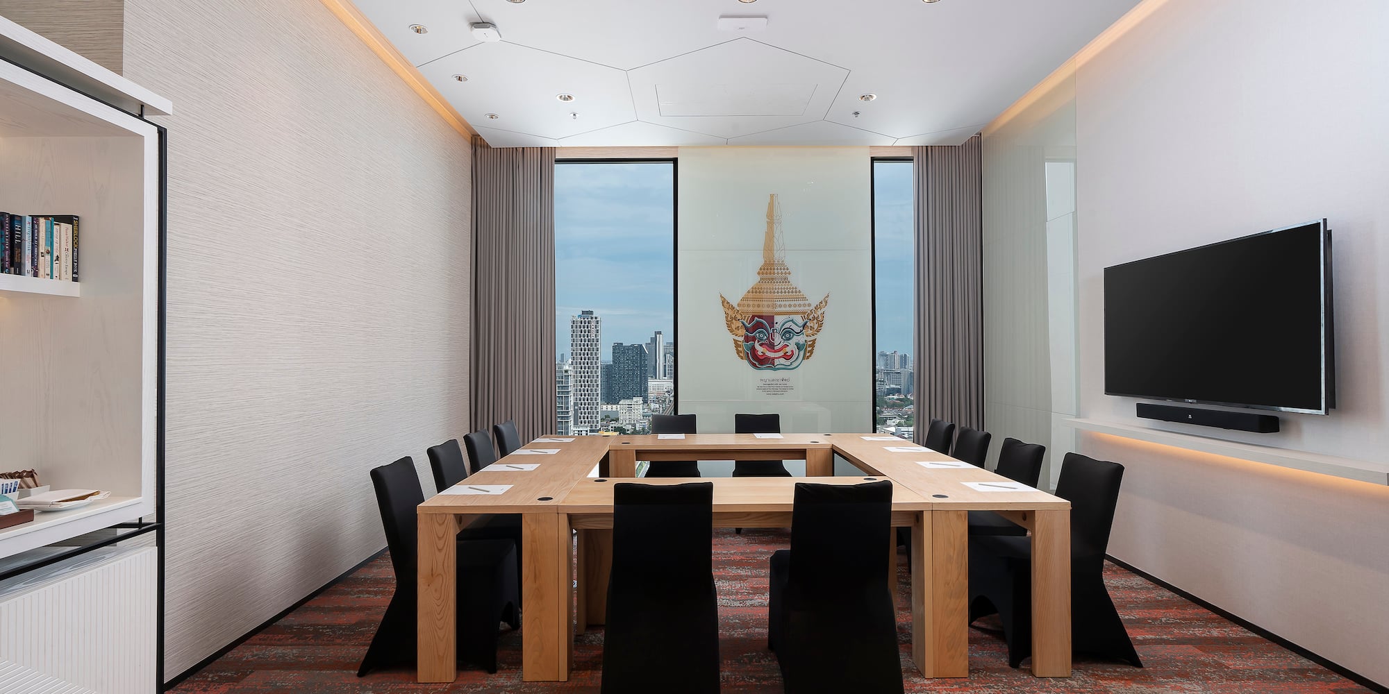 a room with a table and chairs