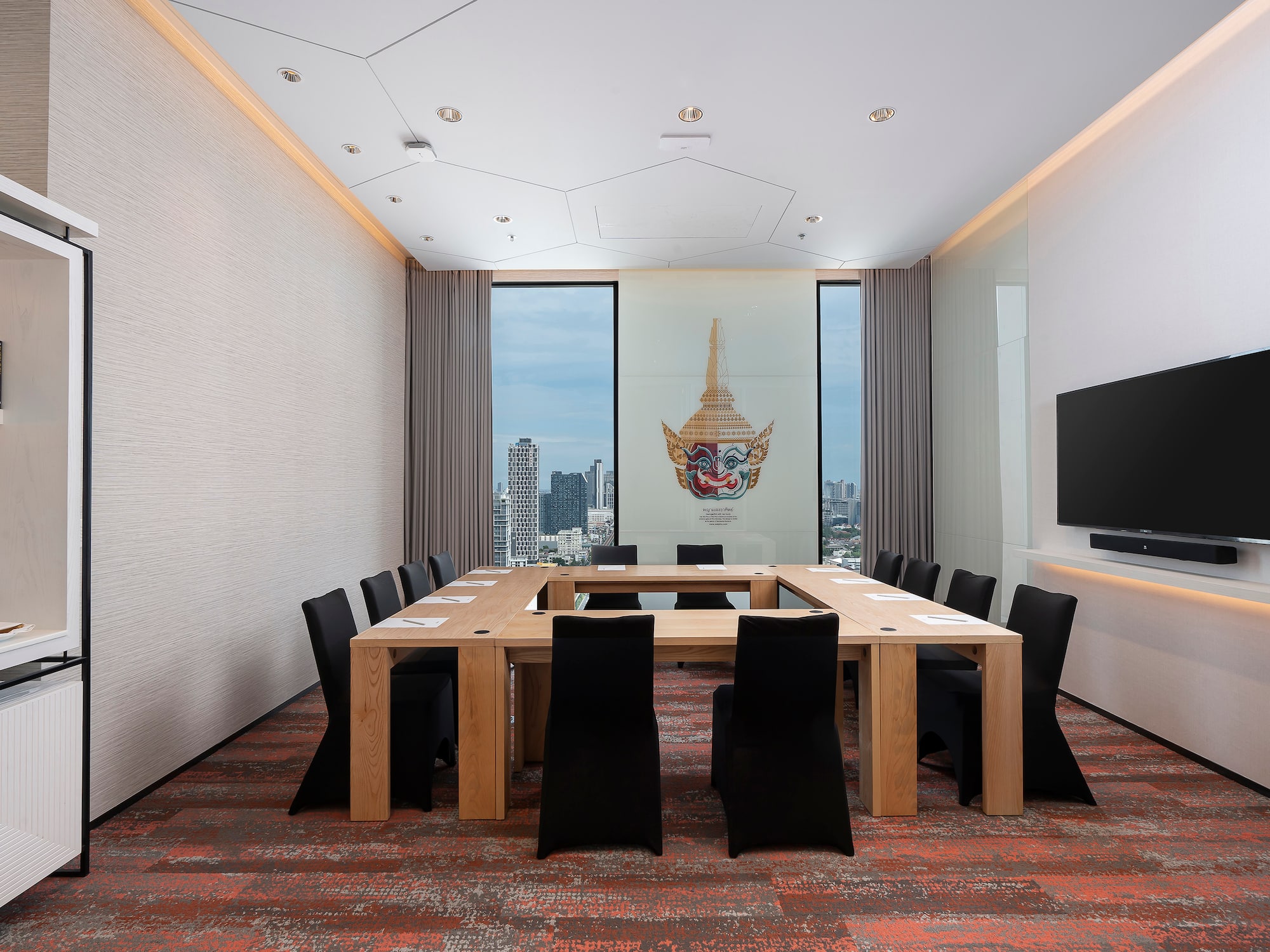 a room with a table and chairs