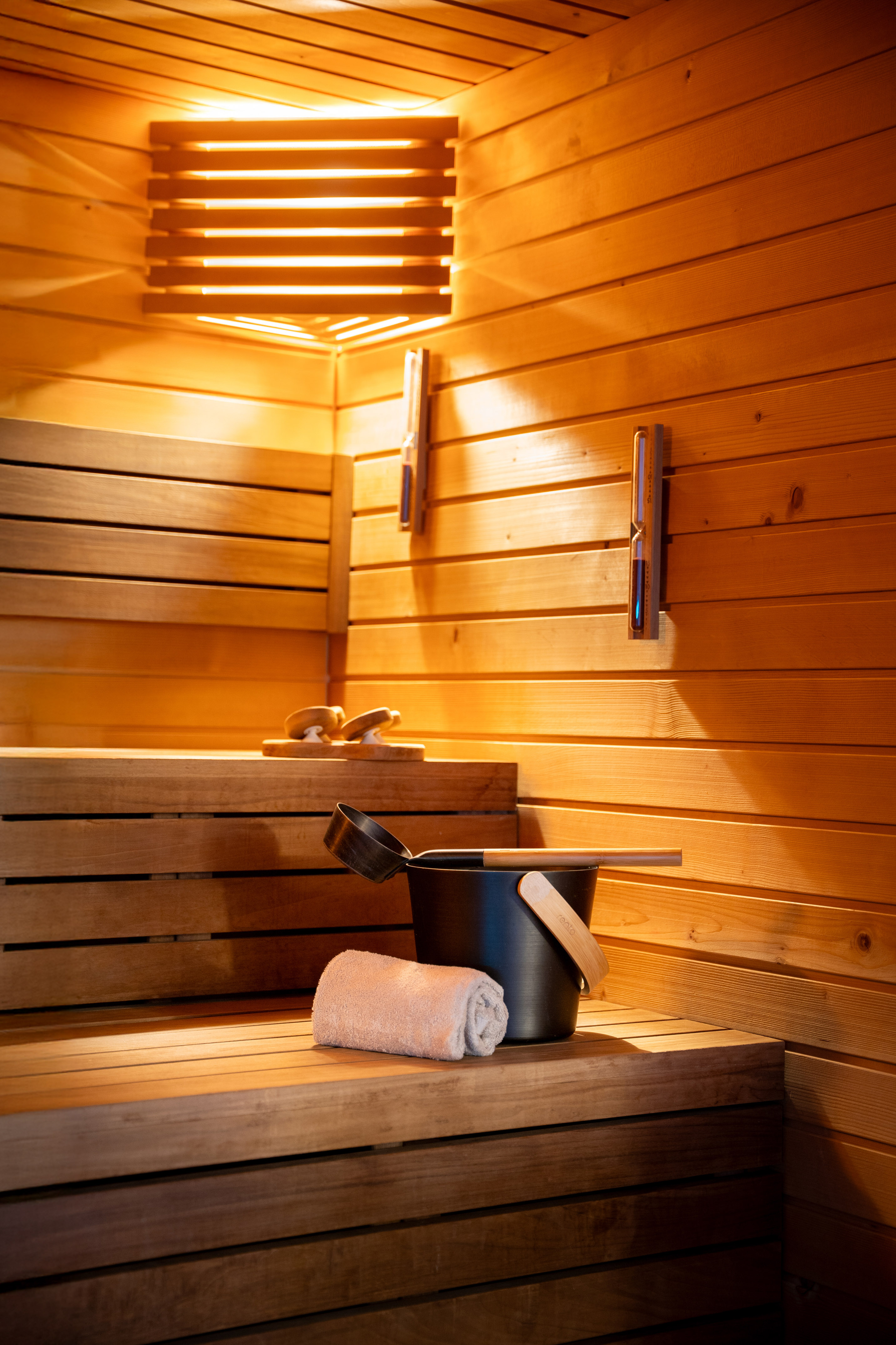 a wooden sauna with lights