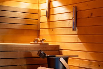 a wooden sauna with lights