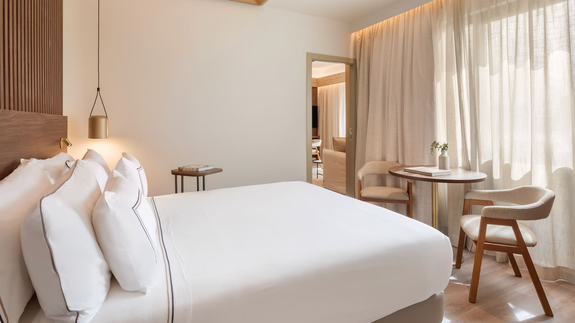 a bed and table in a room