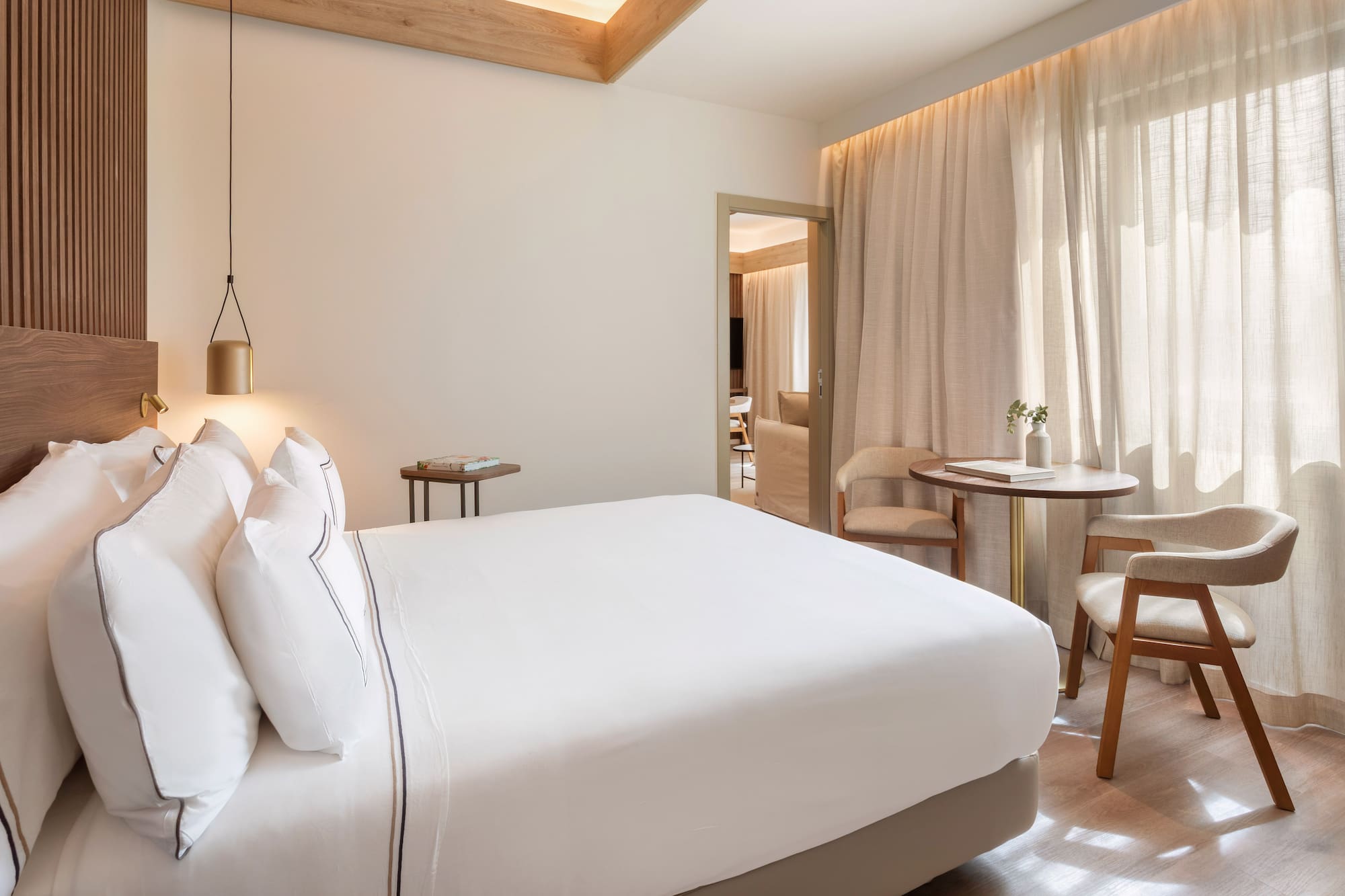 a bed and table in a room