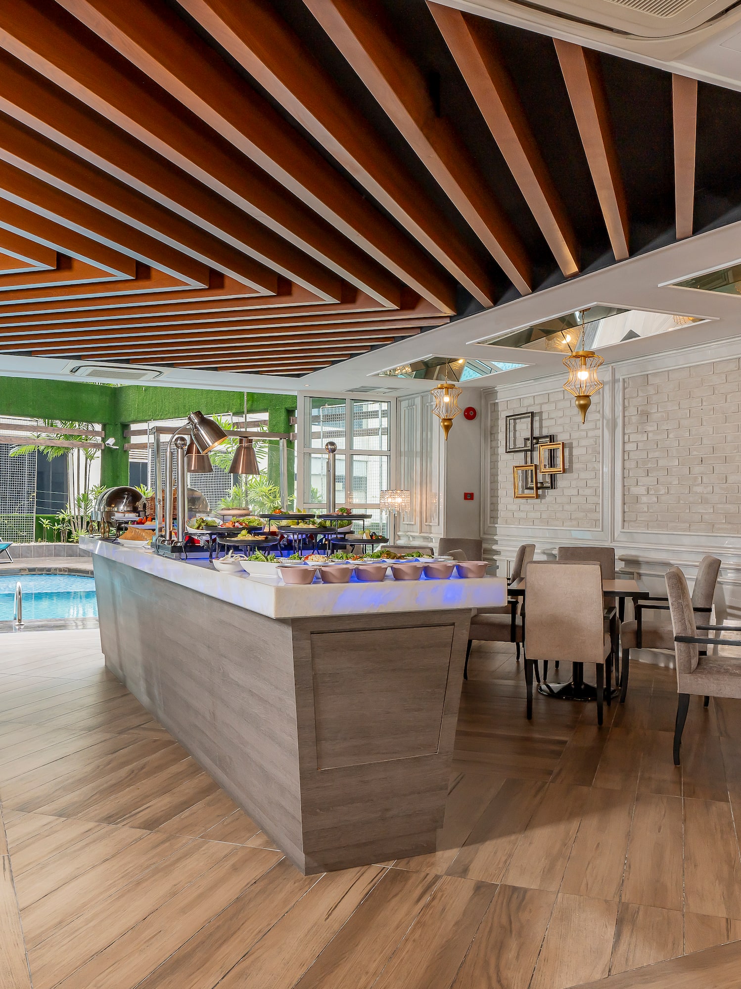 a room with a pool and a bar