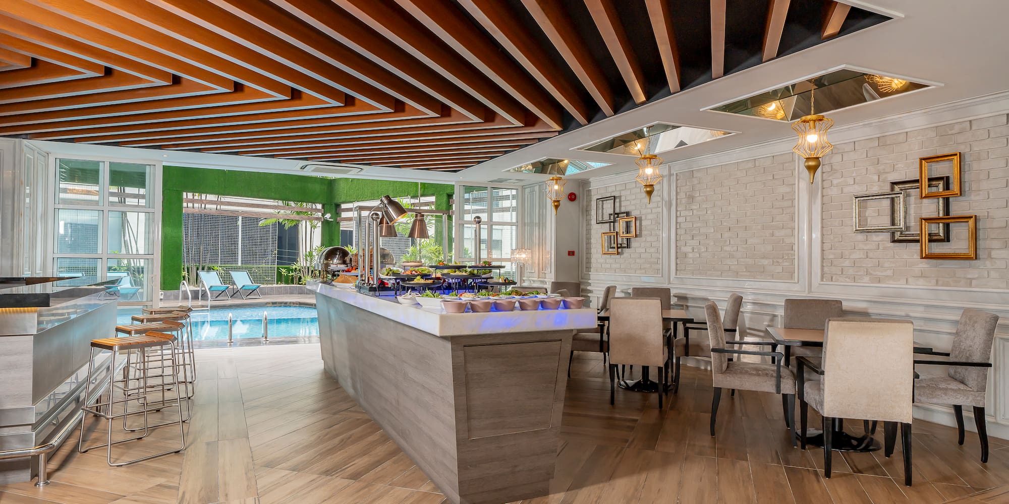 a room with a pool and a bar