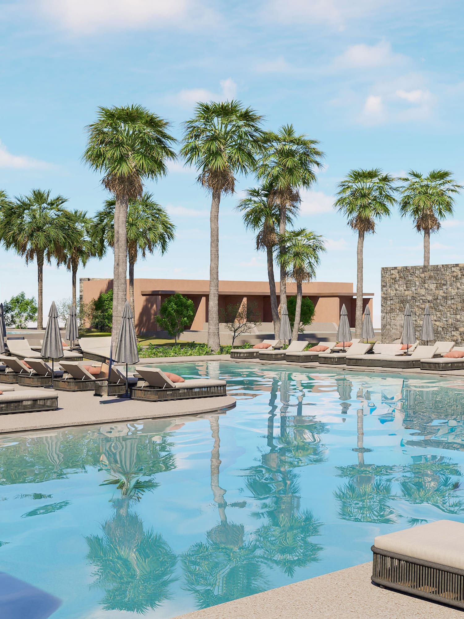 a pool with lounge chairs and palm trees
