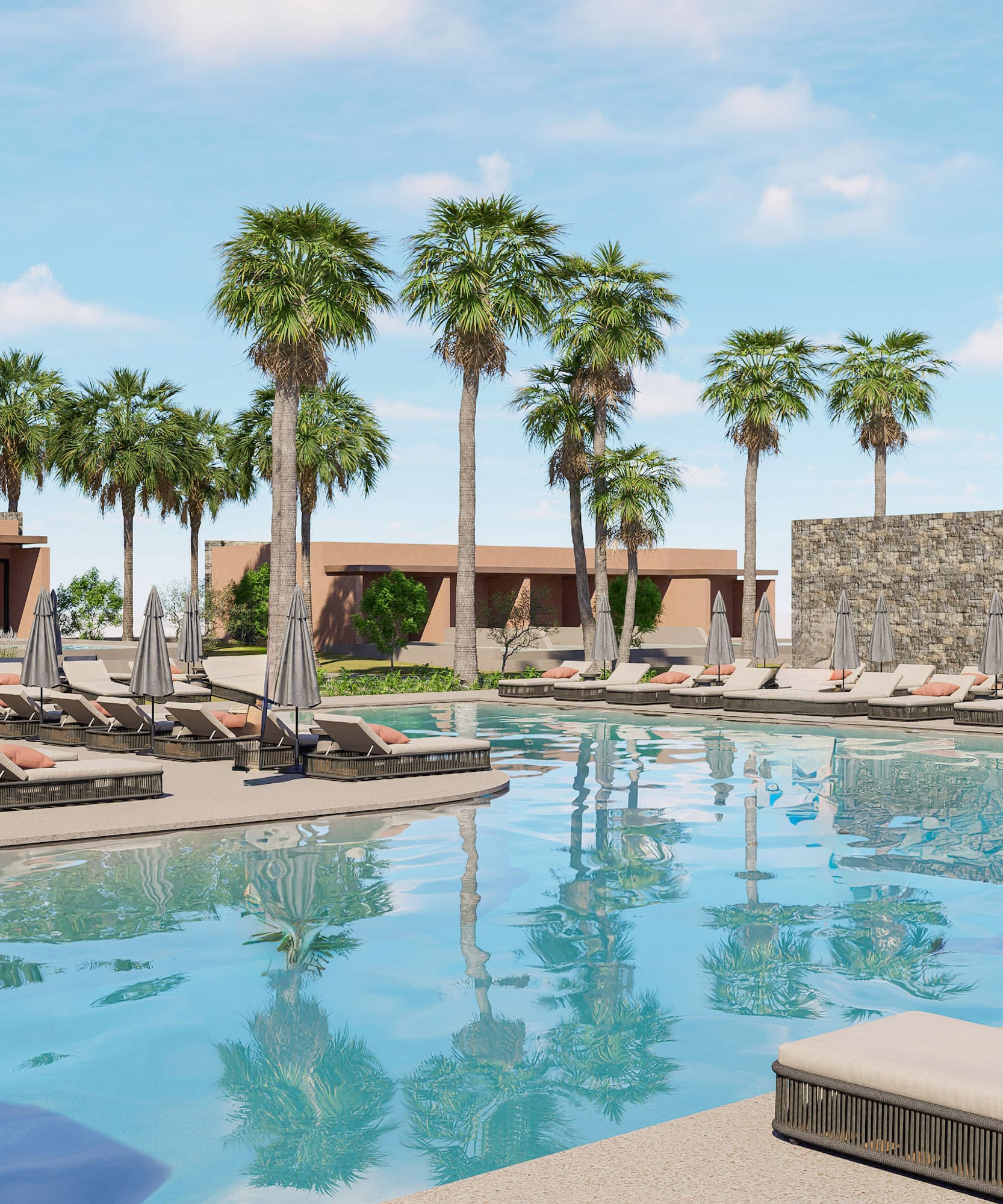 a pool with lounge chairs and palm trees