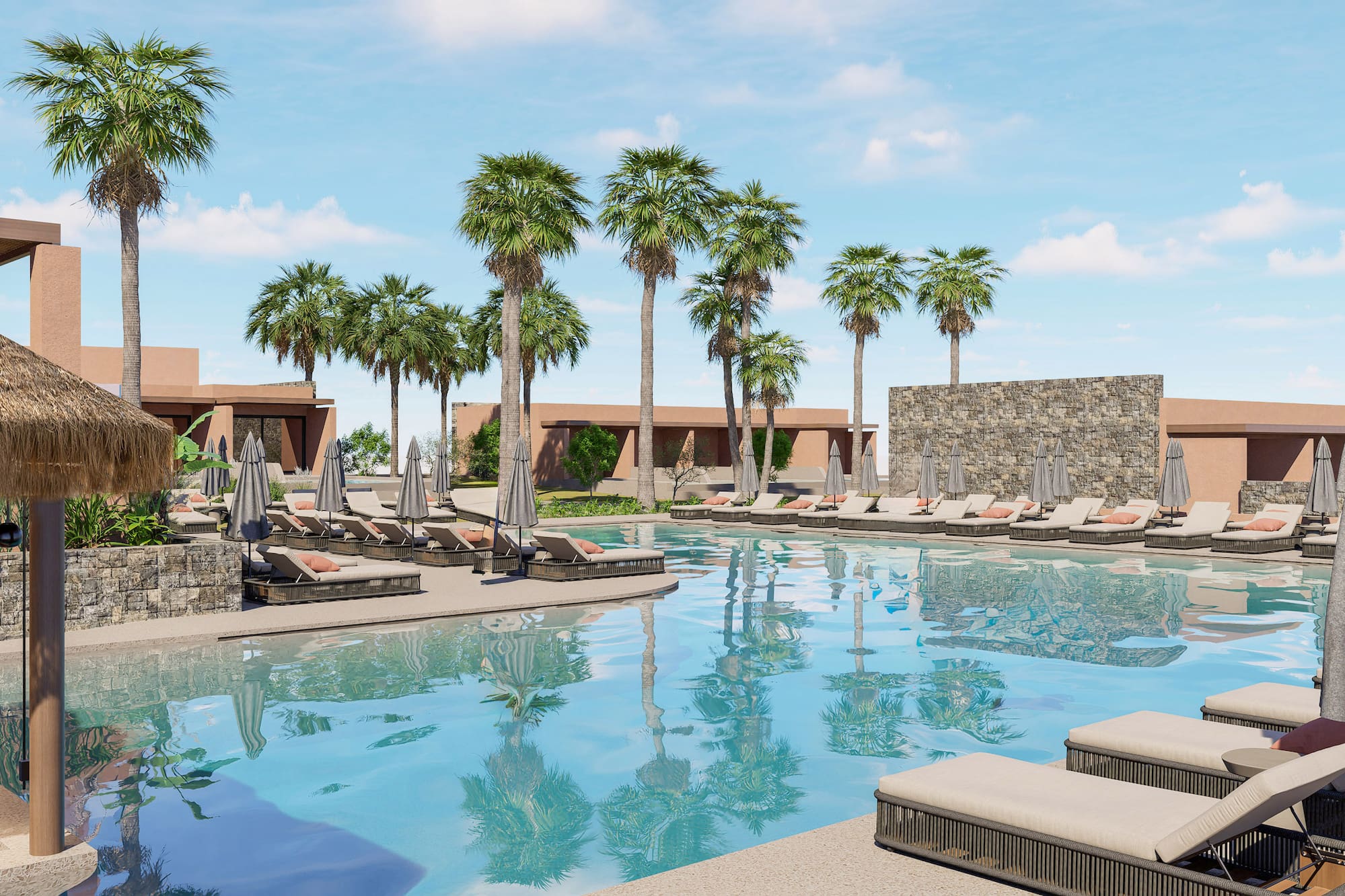 a pool with lounge chairs and palm trees