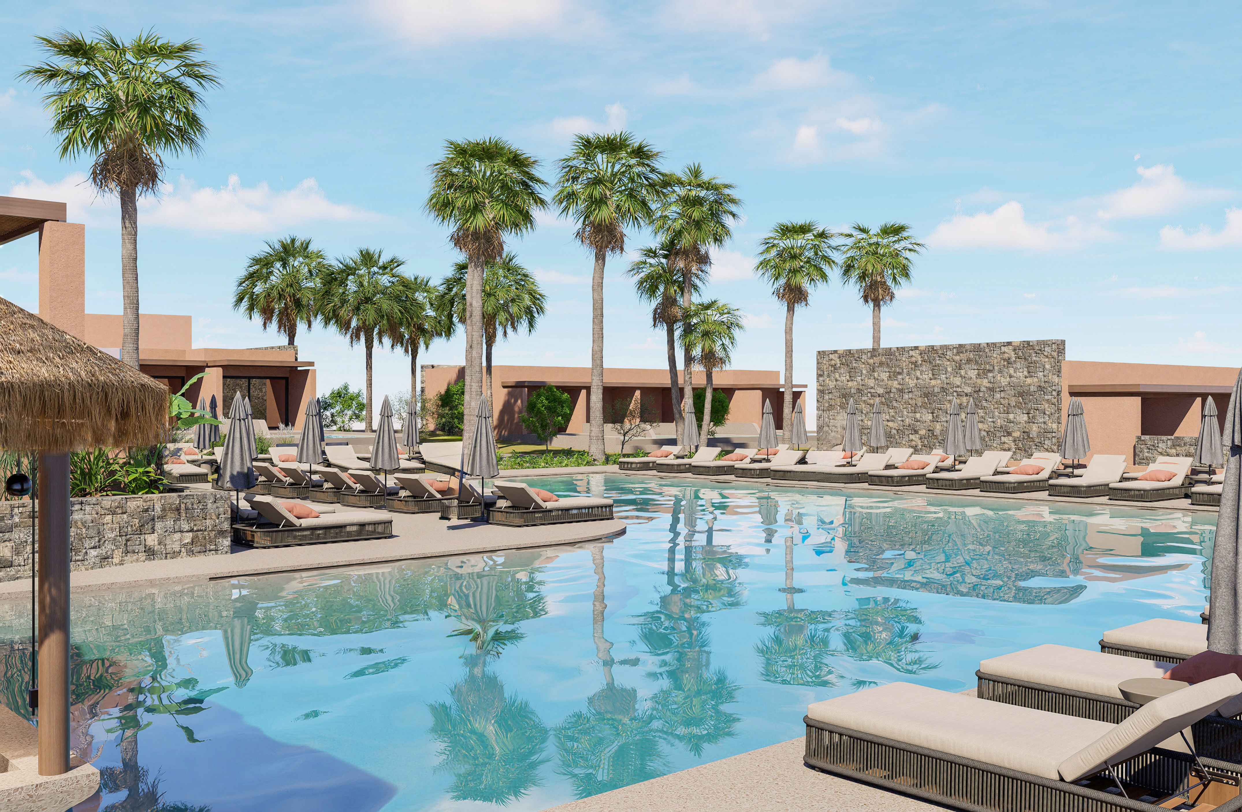 a pool with lounge chairs and palm trees