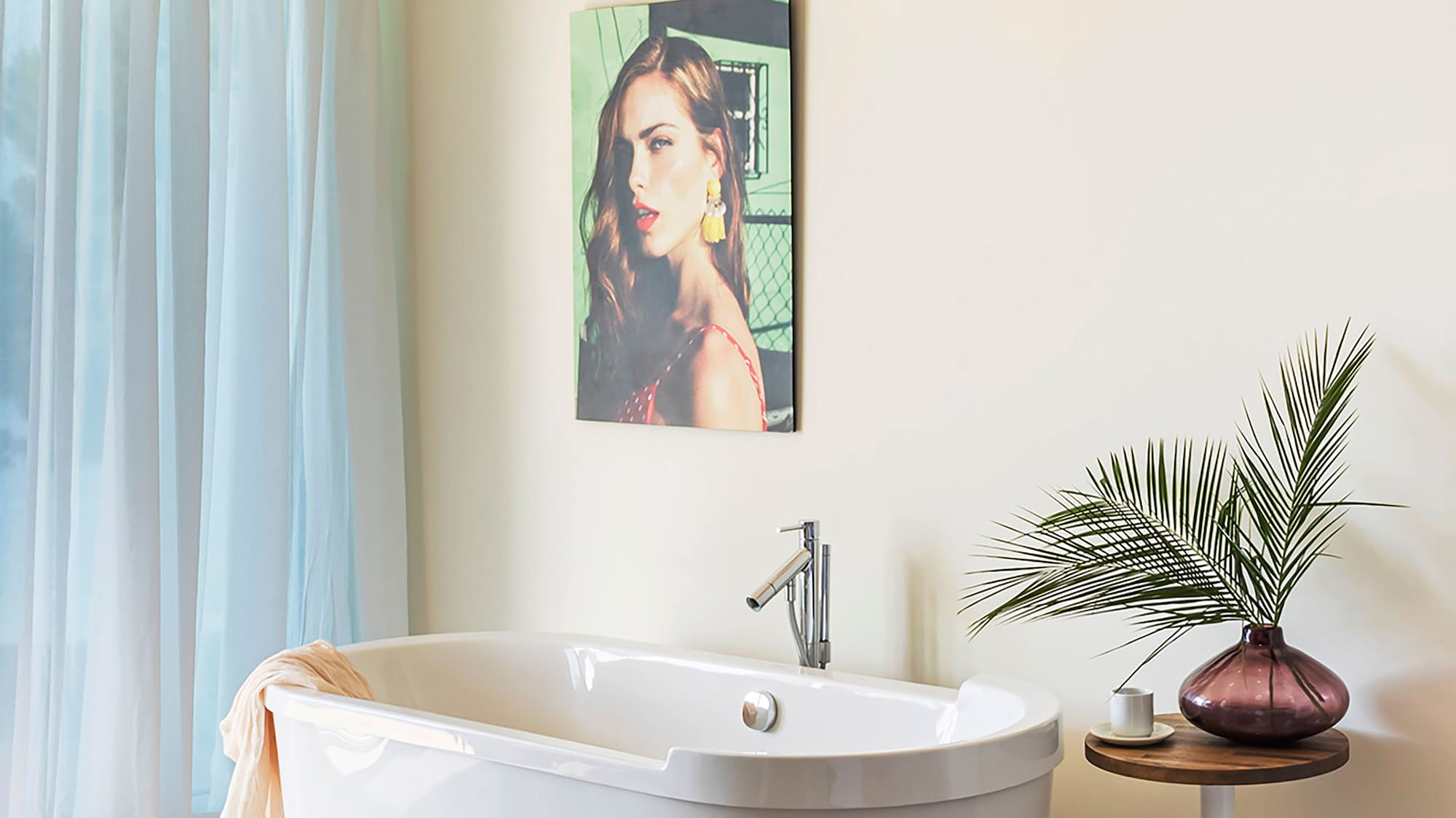 a white bathtub in a bathroom