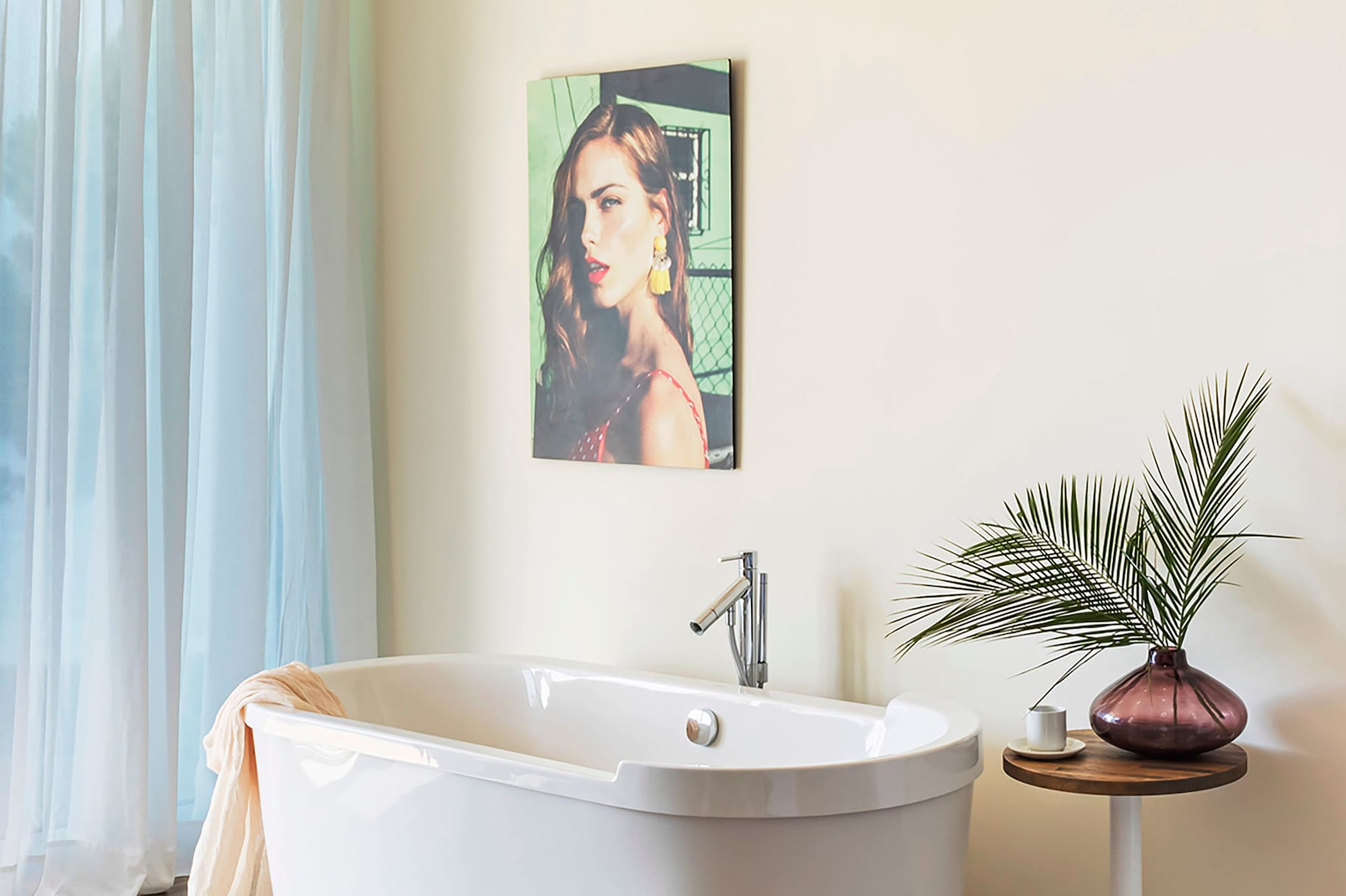 a white bathtub in a bathroom