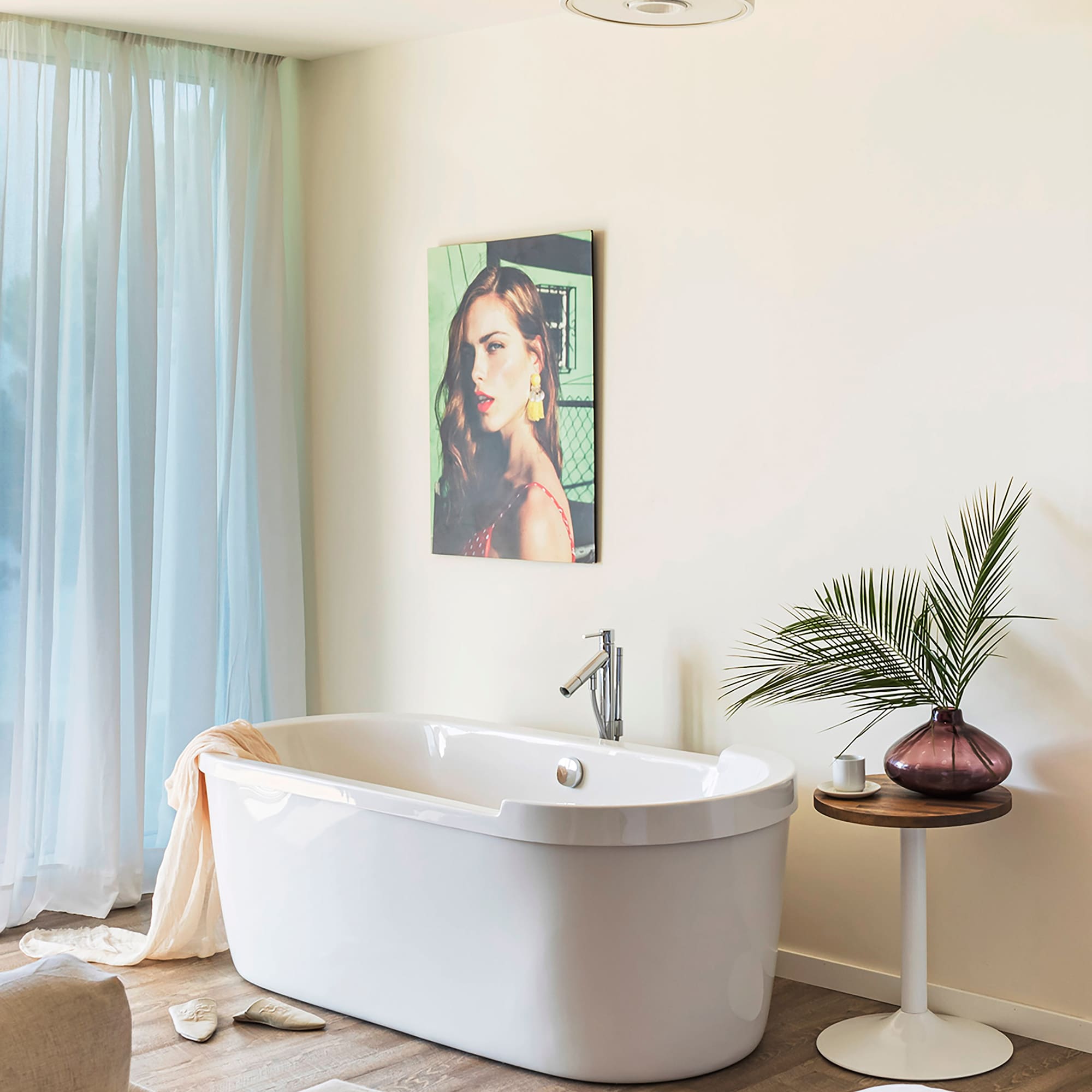 a white bathtub in a bathroom