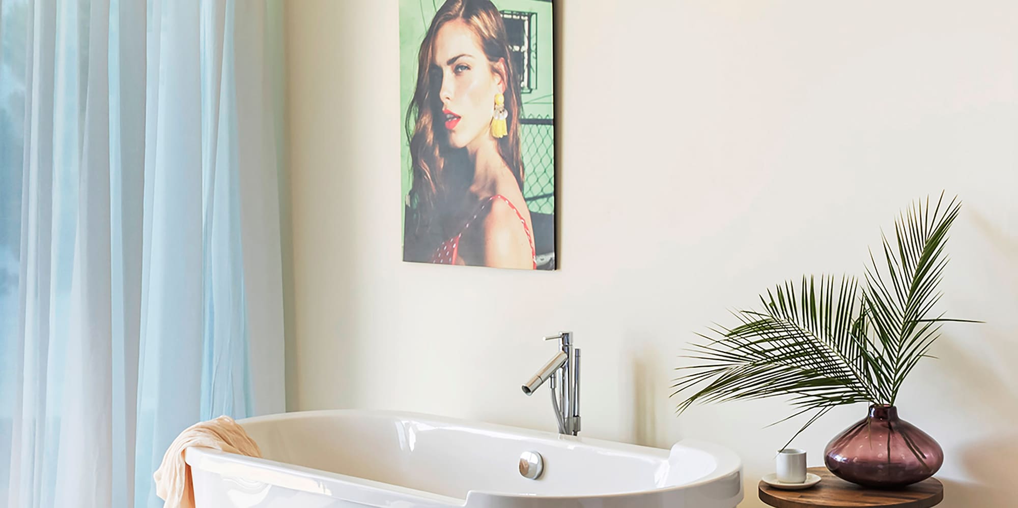 a white bathtub in a bathroom