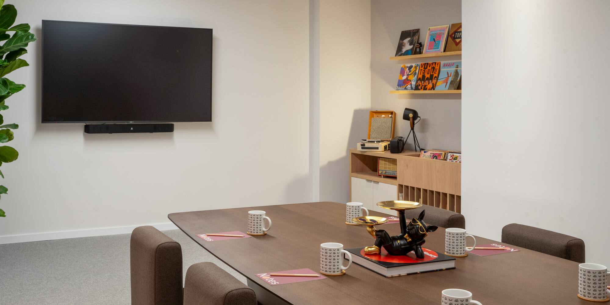 a room with a table and chairs