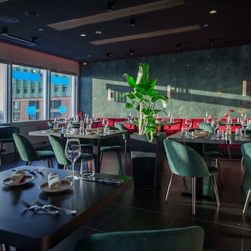 a room with tables and chairs