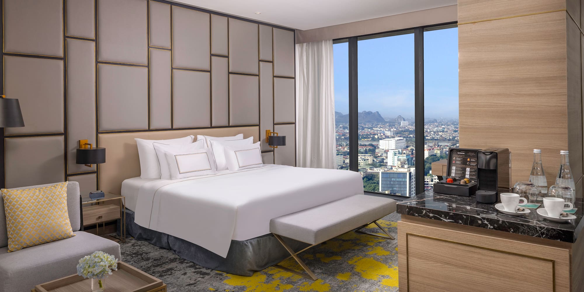 a room with a large bed and a large window