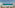 Hotel balcony with chairs, table, and stunning turquoise ocean view.