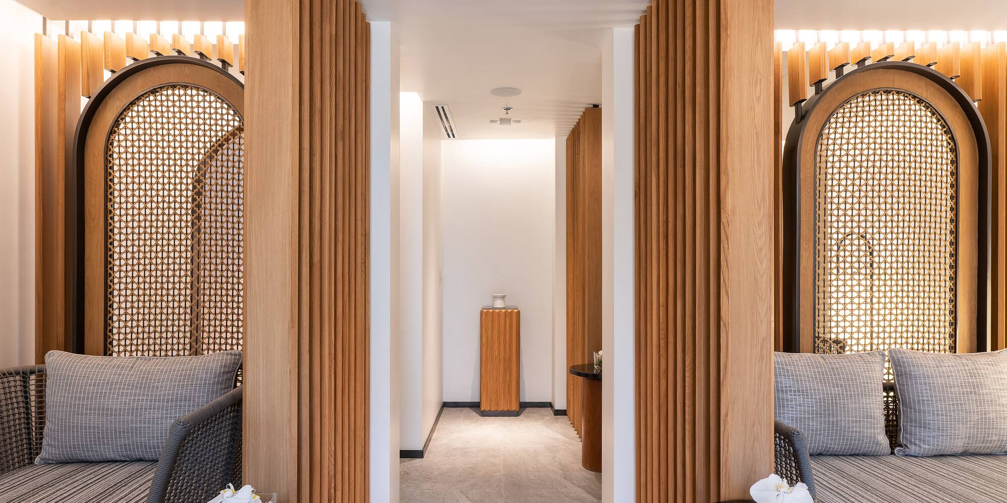 a hallway with chairs and tables