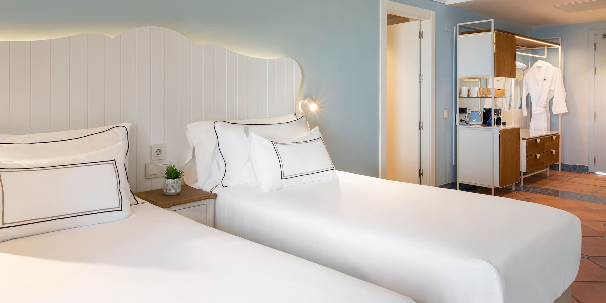 two beds in a hotel room