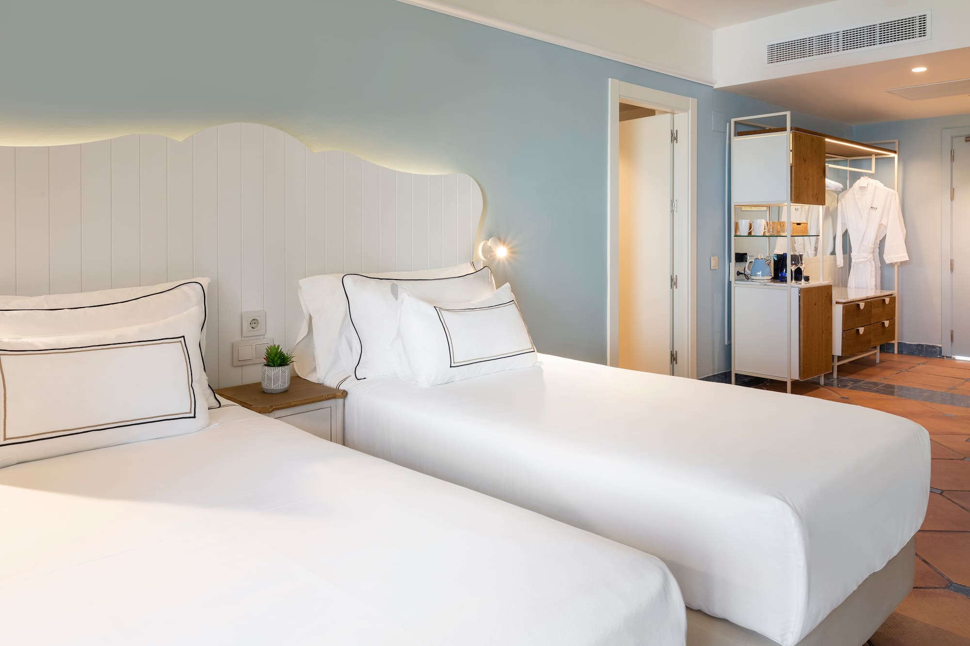 two beds in a hotel room