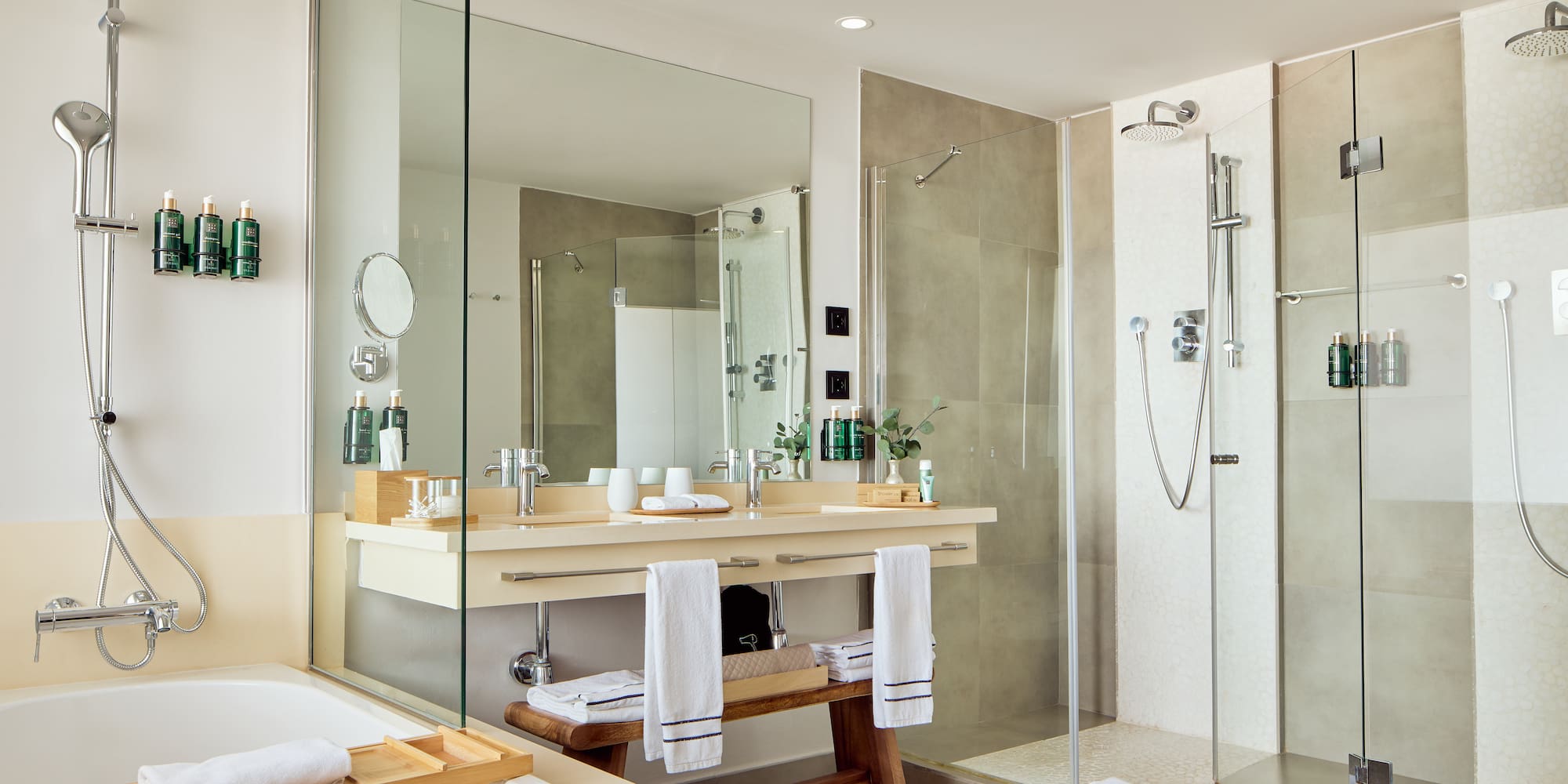 a bathroom with a shower and a sink