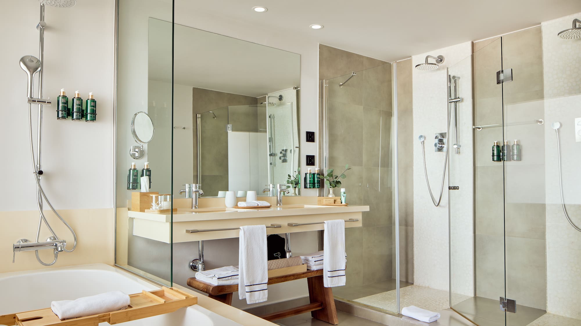 a bathroom with a shower and a sink