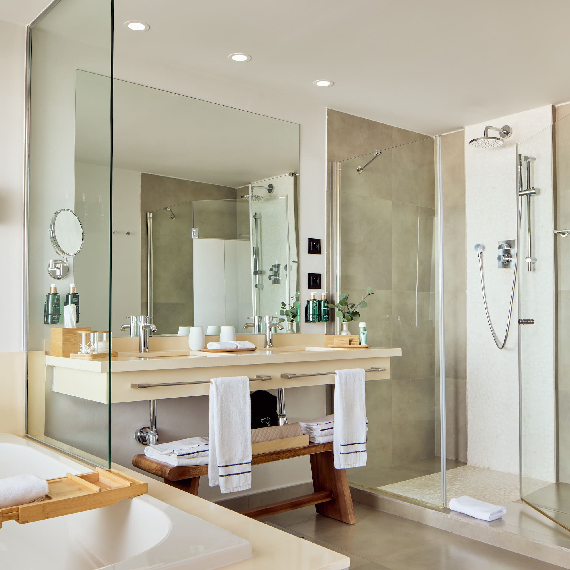 a bathroom with a shower and a sink