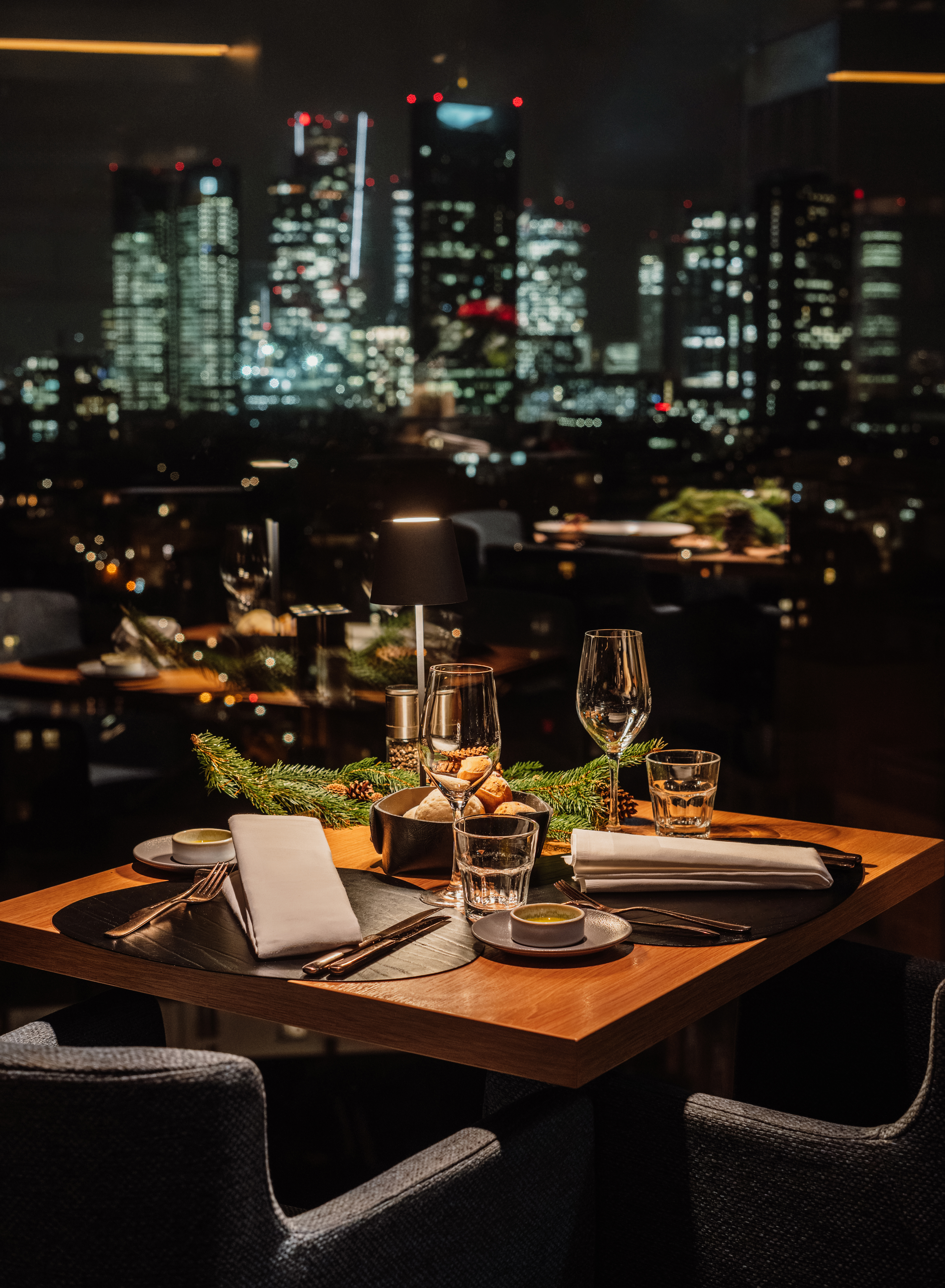 a table with glasses and plates on it