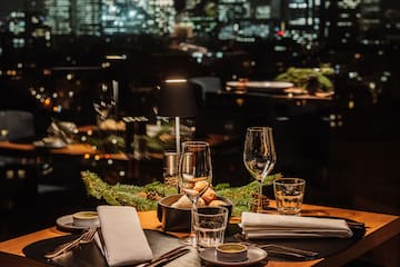 a table with glasses and plates on it