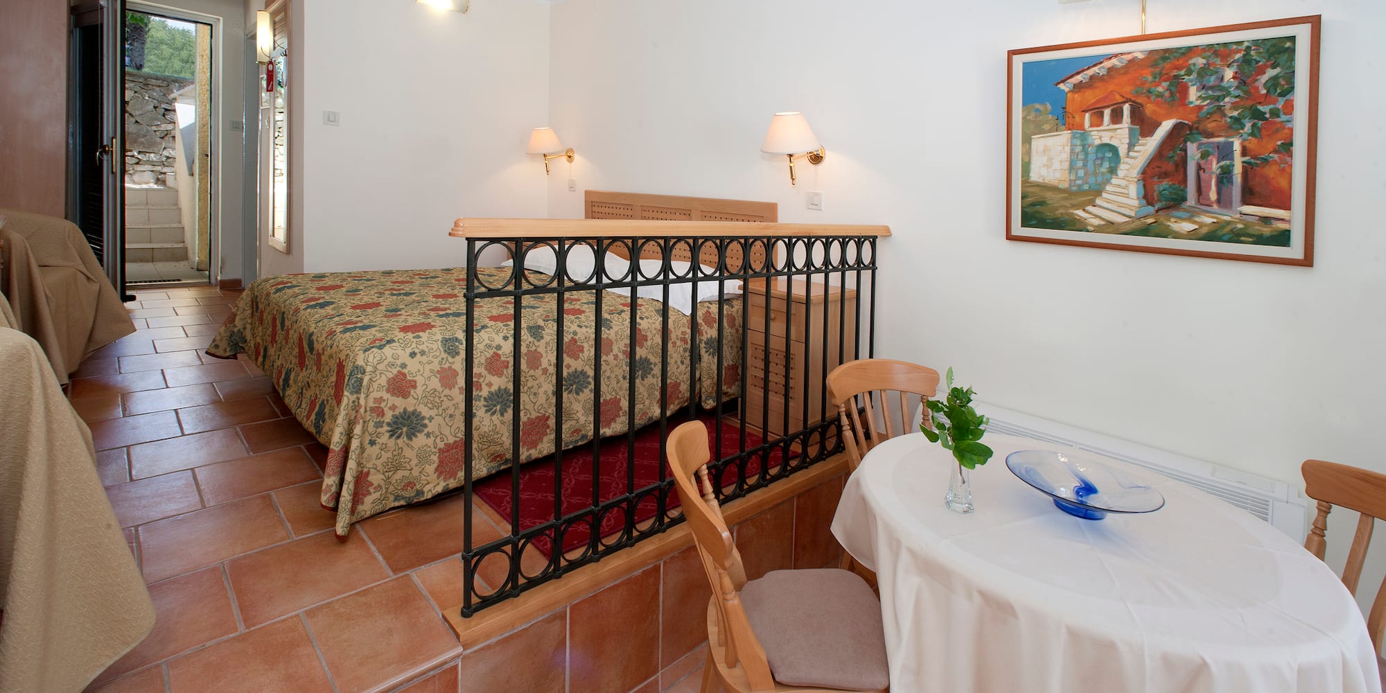 a room with a bed and a table