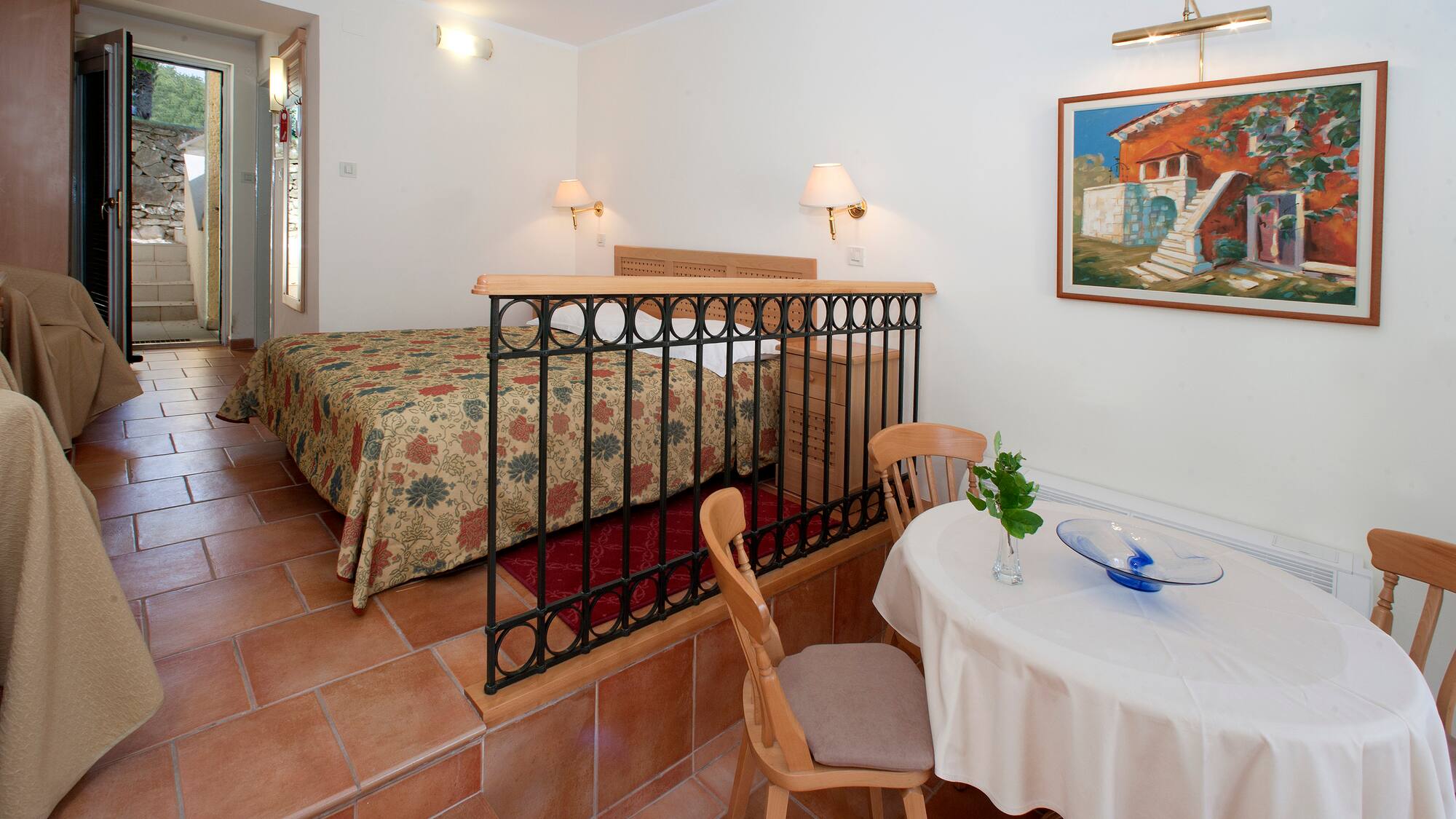 a room with a bed and a table