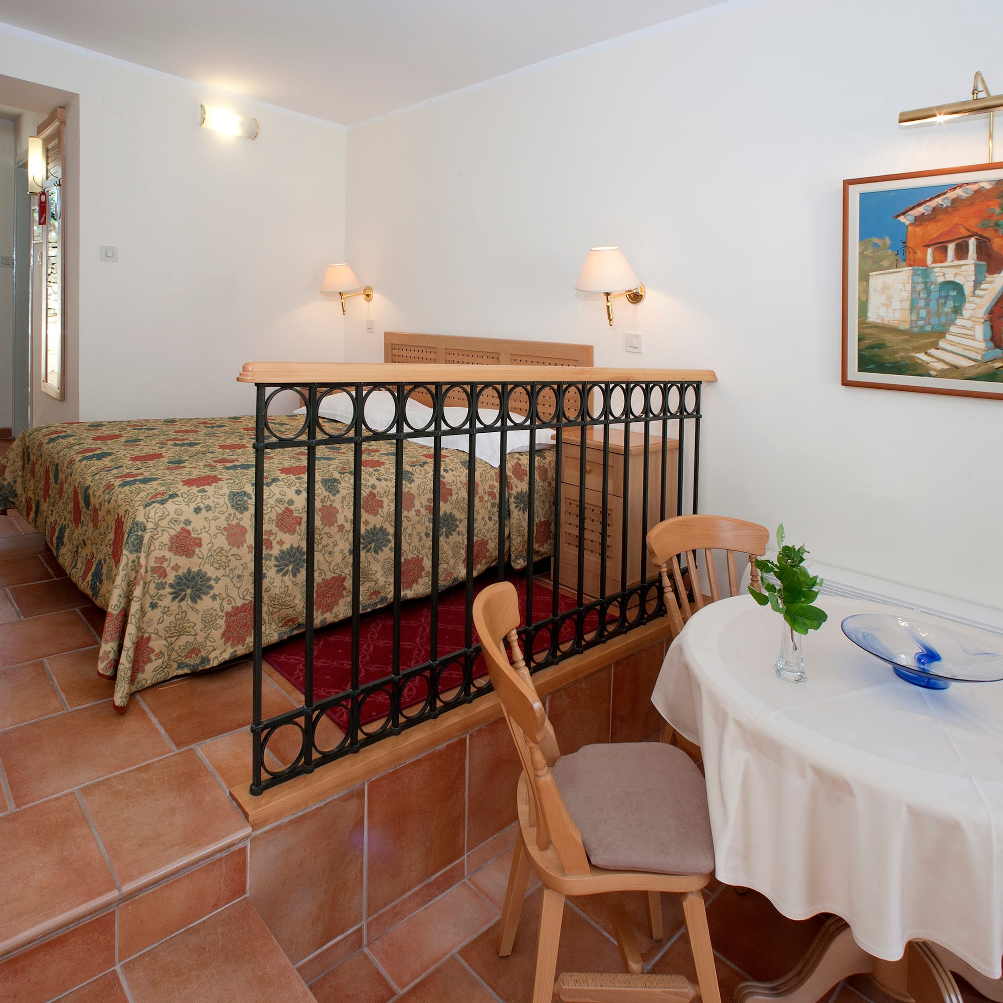 a room with a bed and a table